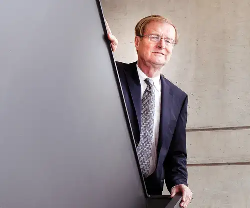 A man standing on a staircase