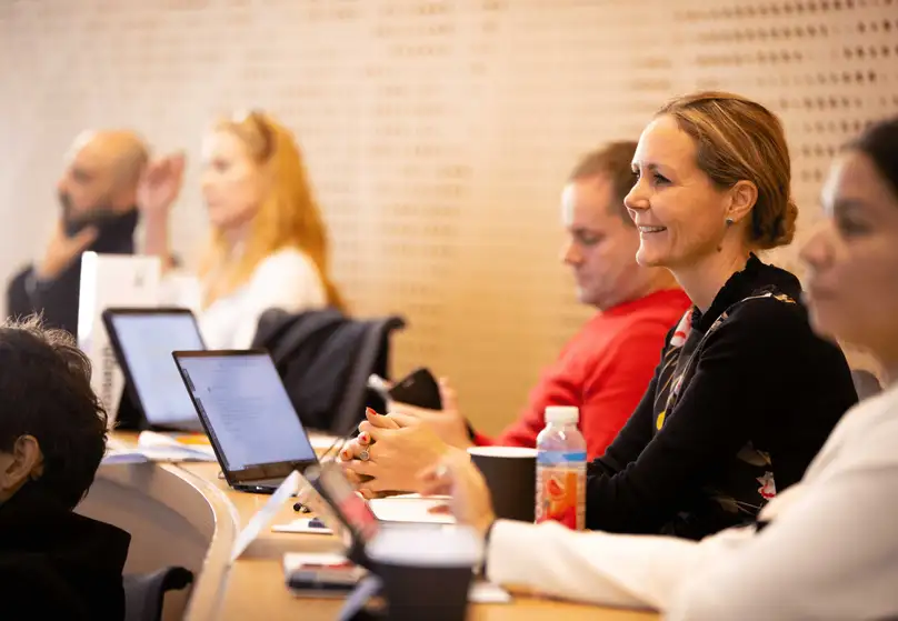 A audience sits during a talk.