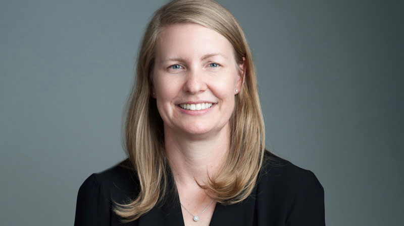 a woman smiling for the camera